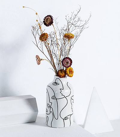 Ceramic Vase Irregular face Design